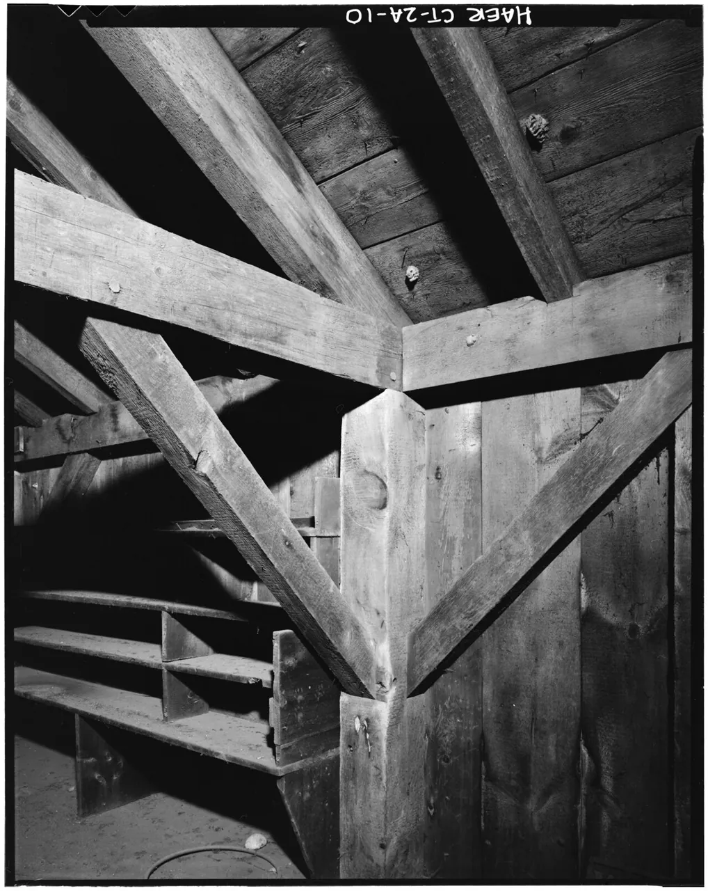 Barn timber-frame brace and stairs