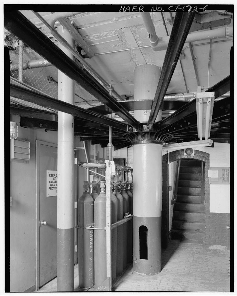 Basement, showing central cast-iron column and radiating iron beams