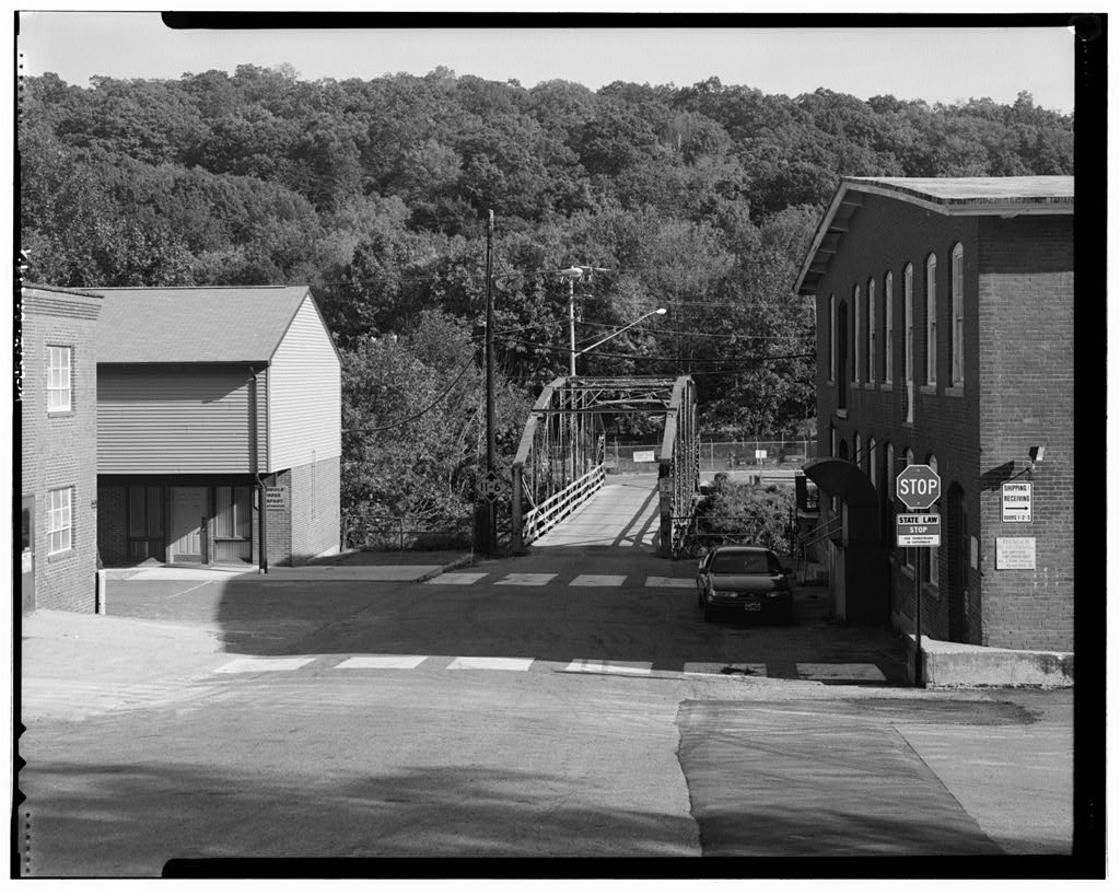 View southeast, general view showing bridge and setting from west end of bridge, river street near intersection with main street — September 1998