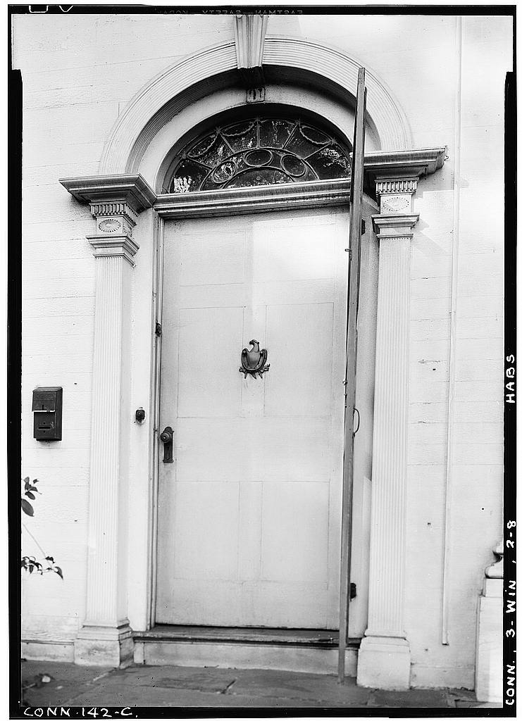 Exterior, detail entrance doorway under pediment