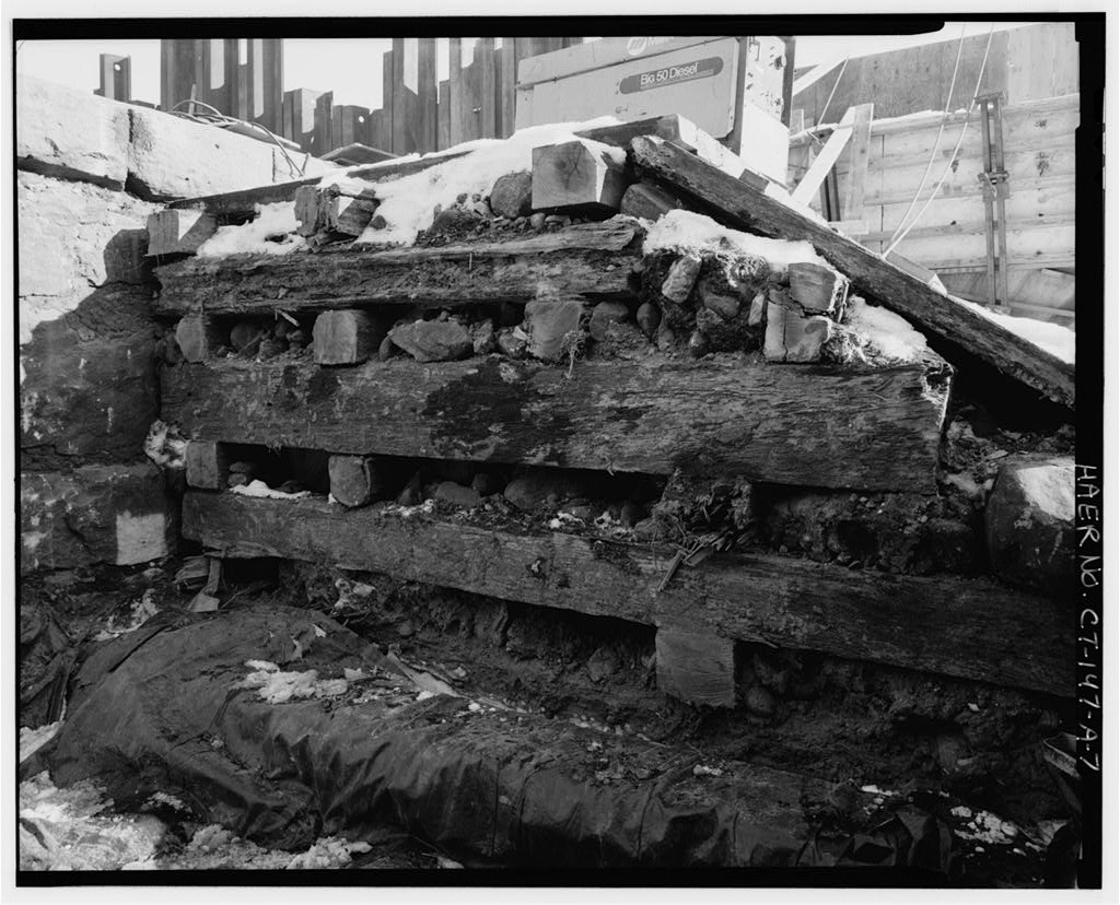 Section view east, west end of dam, December 1995, showing 1915 cribbing; 1882 masonry on left