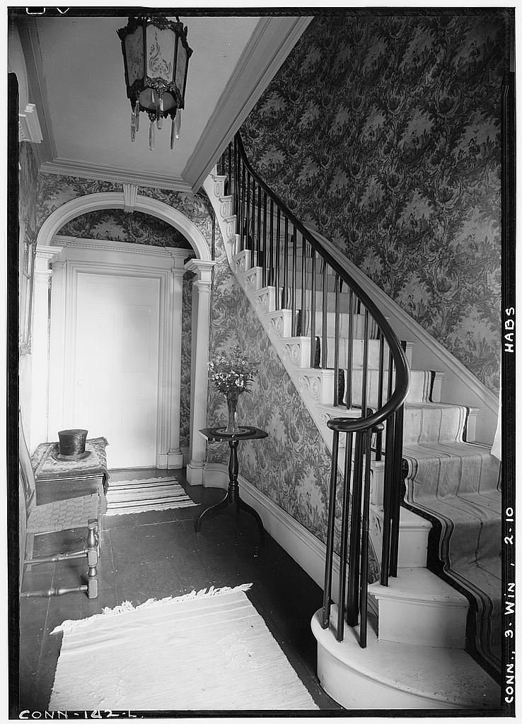 Int. detail of stairway and arch in front hall, looking from entrance door